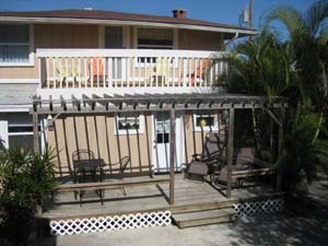 Back of home, showing both 2 bedroom apts